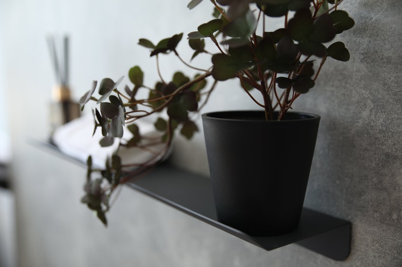 Cosmetic floating shelf in bedroom
