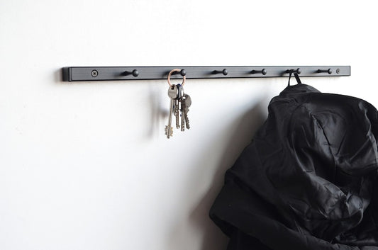 Metal wall mounted coat rack